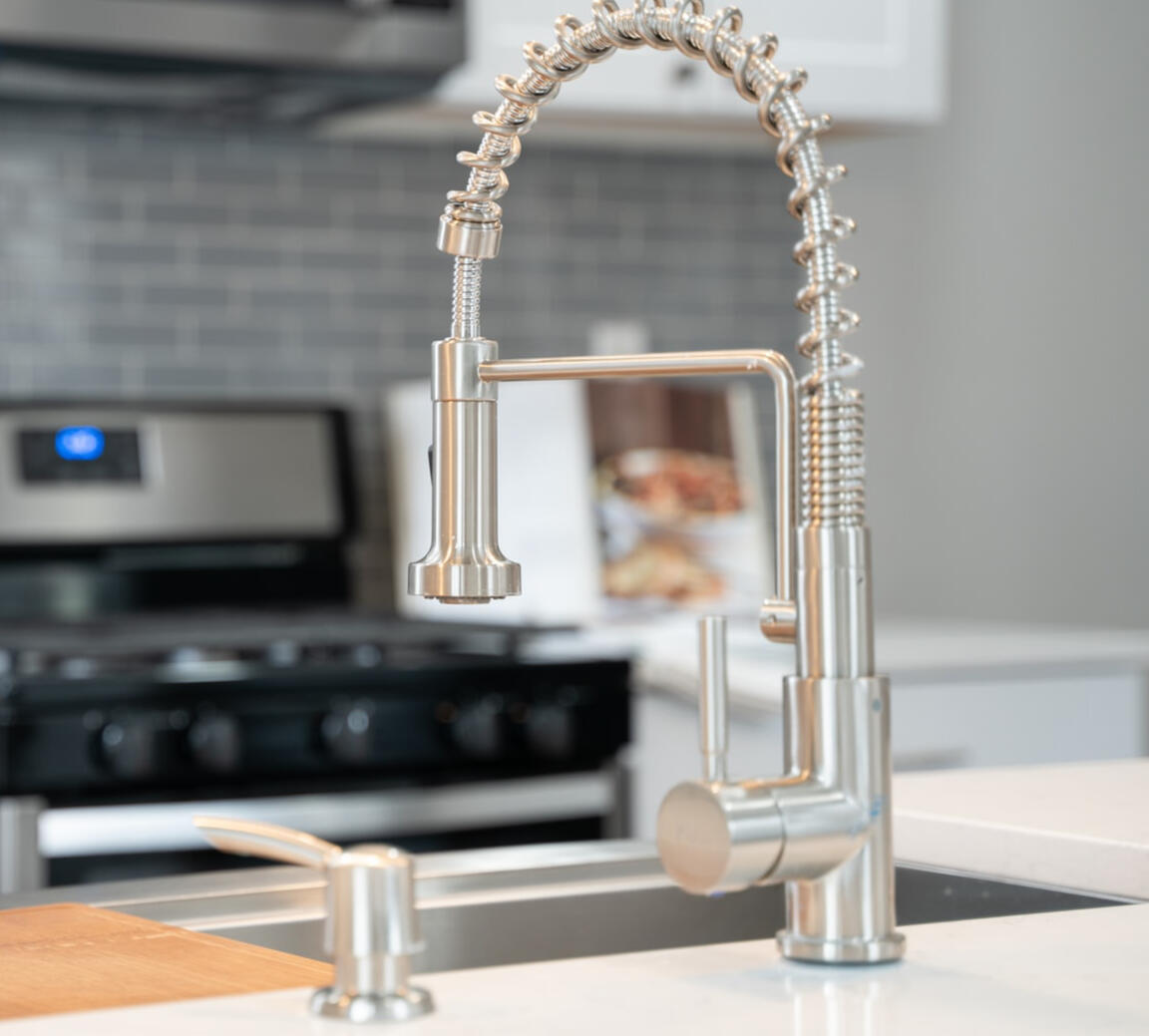 Kitchen plumbing and faucet by Gilbert Plumbing Co Port St Lucie FL
